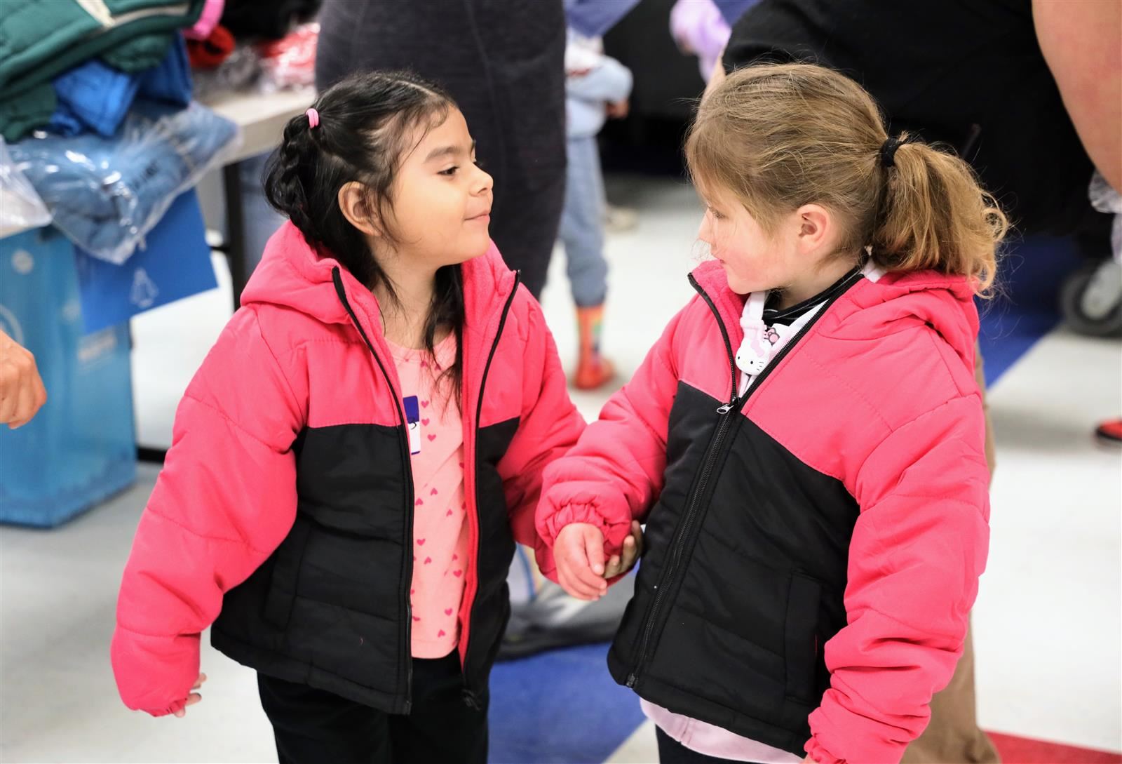 Valencia Park Students in coats holding hands